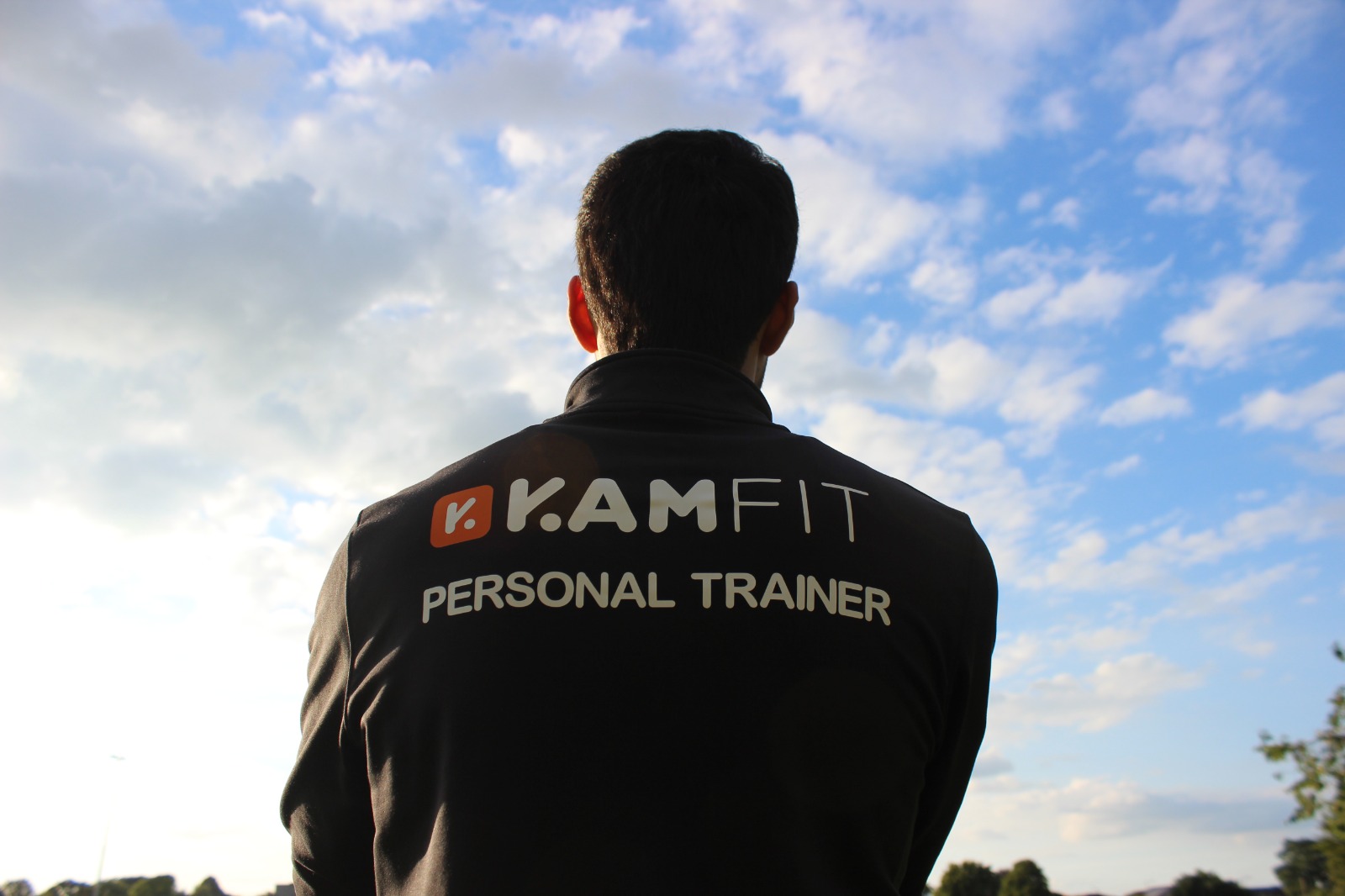 KAMFIT personal trainer looking out at the horizon